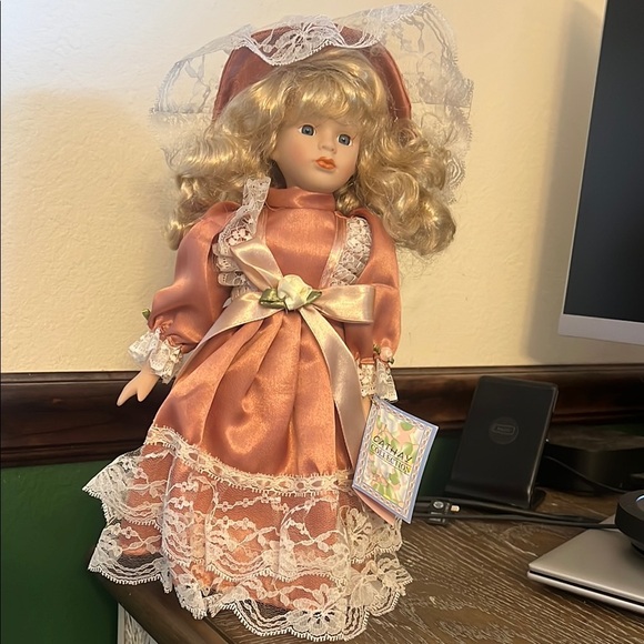 Charming Porcelain Doll in Peach Dress - Picture 1 of 4